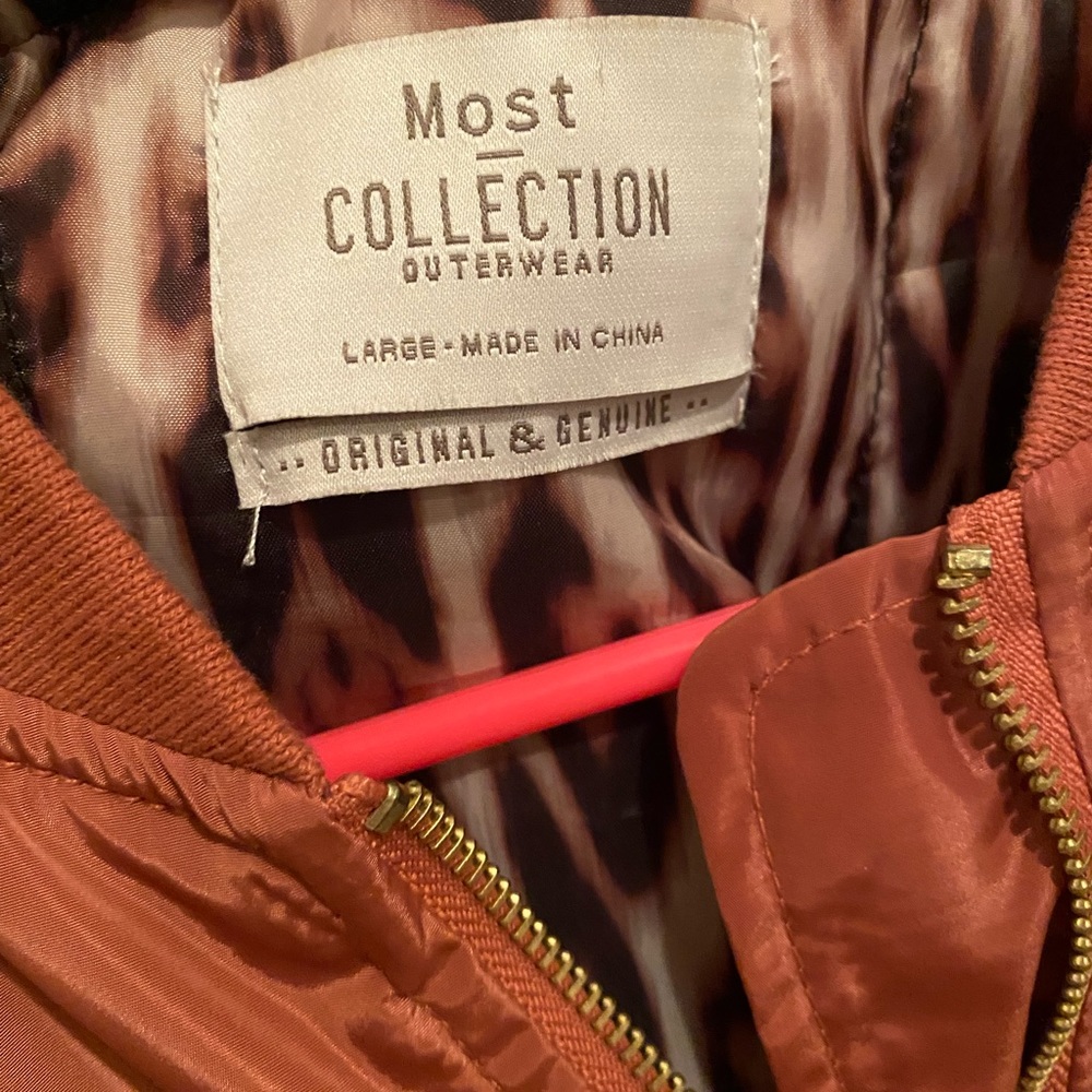 Beautiful dark rose colored, bomber style jacket.